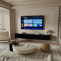 Meuble TV flottant noir de luxe moderne avec coins arrondis, console multimédia murale minimaliste avec finition grain de bois