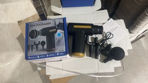 Mini pistola de masaje portátil directa de fábrica para aliviar los músculos masajeador de tejido profundo de percusión eléctrica - Product Image 5