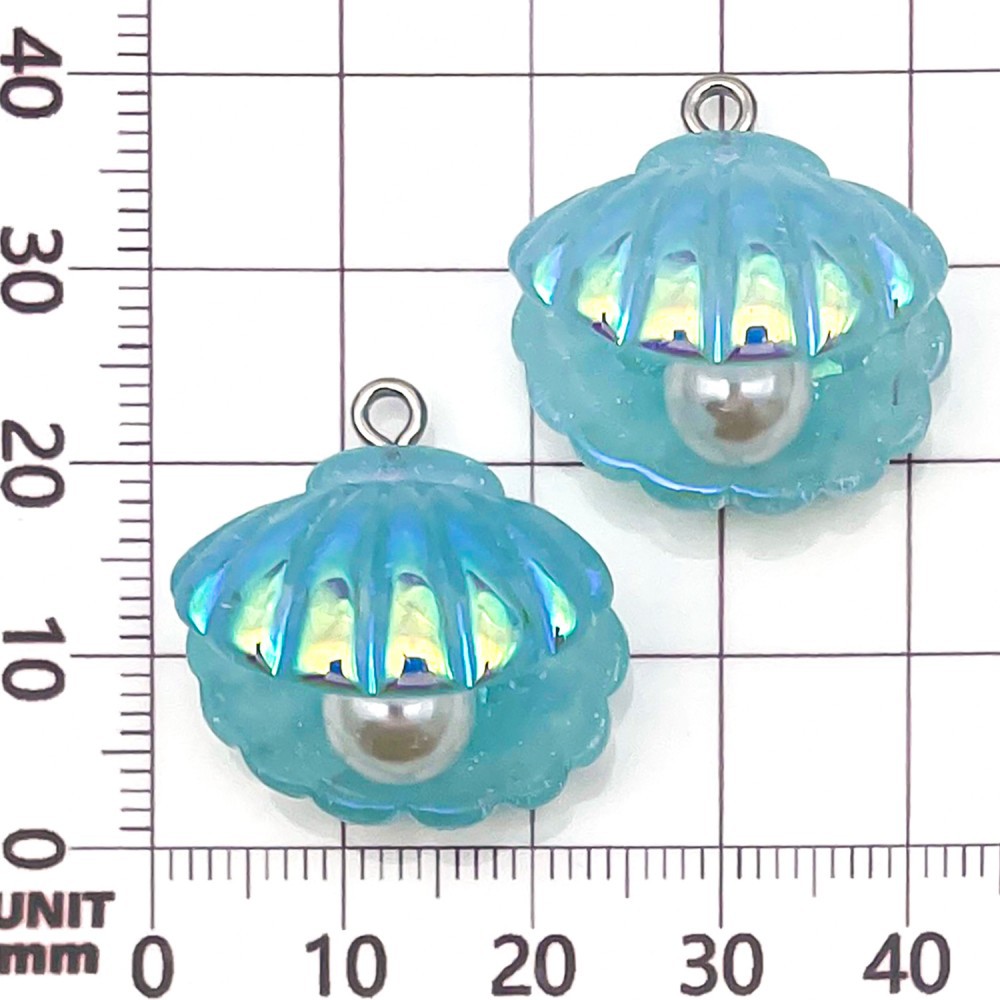 Una concha de perla iridiscente de resina azul lago, 23*23*17 mm - 3,1 g - 24105