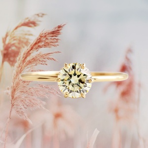 แหวนแต่งงานผู้หญิงดีไซน์เงินแท้ 925 ประดับเพทายสีเหลืองจาก UM JEWELRY - Product Image 4