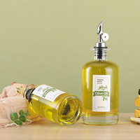 Bouteilles distributrices d'huile d'olive en verre rond Marasca de qualité alimentaire 12oz 16oz avec bec verseur en acier inoxydable