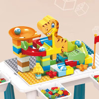 Nouveau produit éducatif très demandé : Ensemble de construction 104 pièces en plastique pour enfants, comprenant un circuit de dinosaures à assembler soi-même, des briques coulissantes, une table et des chaises