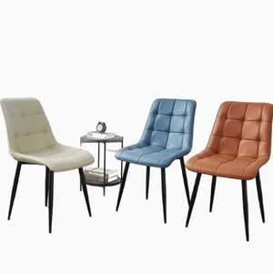 Chaises de salle à manger en tissu rembourré de qualité supérieure avec pieds en métal foncé et silhouette fluide pour usage domestique moderne, rembourrage bleu marine - Product Image 1