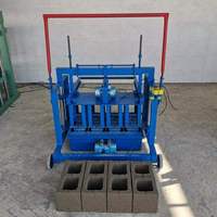 2-45 petite machine manuelle de fabrication de briques en blocs de ciment en béton à vendre en Ouganda