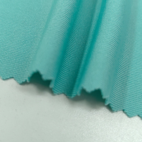 Vente en gros directe d'usine : Tissu élastique tricoté en polyester pour vêtements décontractés