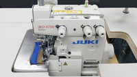 Machine à coudre JUKIS MO-6704DA d'occasion, bon état, machine à surjeter très demandée
