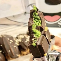 Meilleure vente en gros Barre de chocolat Kunafa aux pistaches fines Bonbons Dubai Bonbons croustillants enrobés de chocolat Biscuits alimentaires halal