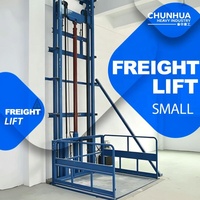 Harga Pabrik Lift Kargo Hidrolik Vertikal Konveyor Bolak-balik Kontrol Elektrik Kapasitas 500kg Tinggi Angkat 10m untuk Kargo