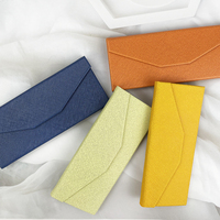 Boîte de lunettes de soleil en verre pour les yeux couleur Logo personnalisé portable étui à lunettes triangle pliant à aimant puissant étanche en PU
