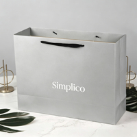 Vente directe d'usine, sac en papier blanc épais et durable, impression personnalisée pour les magasins de vêtements et de chaussures, sac en papier de luxe pour les bijoux