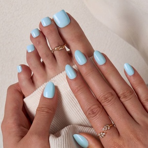 Faux ongles carrés courts artificiels 30 pièces en gros, kit d'ongles et d'orteils en gel souple couleur unie bleu à presser avec colle - Product Image 1