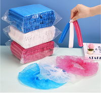 Bonnet bouffant jetable anti-poussière respirant en PP non tissé avec bande élastique pour usage en salon de beauté