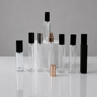 Flacon de parfum en verre transparent de 10 ml et 15 ml, flacon d'échantillon de parfum portable avec bouchon noir et doré pour les voyages