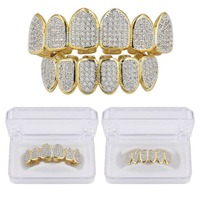 Nouvelle vente en gros de dents dorées pour hommes, Hip Hop, Grillz, Top et bas glacés, dents en zircone cubique, Vampire, personnalisé, 2022
