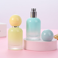 Flacon de parfum en verre rond de luxe de 30 ml avec bouchon en forme de boule de différentes couleurs