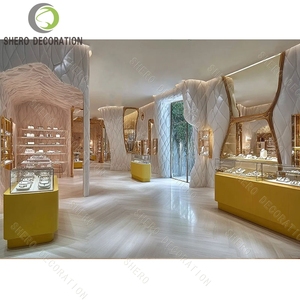Custom Luxury Jewelry Store Display Showcase Set Gold Stainless Steel Glass Counter with LED Light for Diamond Shop Decoration - Product Image 5
