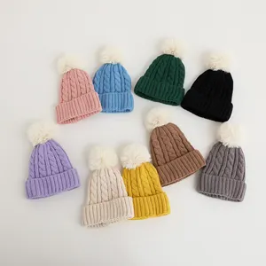 Wholesale winter kids satin lined cuffed knitted hat cute ski outside child baby beanie pompom