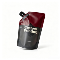 Pochettes souples personnalisées avec logo imprimé, noires mates, de qualité alimentaire, avec bec verseur pour vin, jus et boissons - Tailles 100 ml et 500 ml