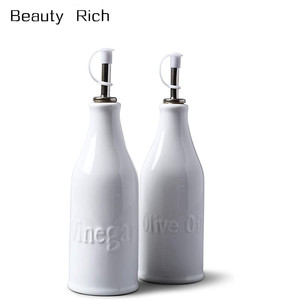 Bouteille d'<span class=keywords><strong>huile</strong></span> d'olive <span class=keywords><strong>et</strong></span> de <span class=keywords><strong>vinaigre</strong></span>, vaisselle en céramique, ensemble de porcelaine traditionnelle, avec verseurs en acier inoxydable de 34cm blanc - Product Image 1