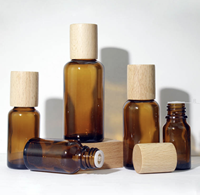 Botol Tetes Minyak Esensial Kaca dengan Tutup Sekrup Kayu Silinder Kustom, Permukaan Frost, Stamping Emas untuk Perawatan Kulit Krim Wajah