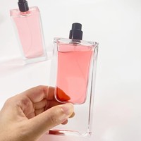 Flacon de parfum en verre épais rond personnalisé de 30 ml, 50 ml, 100 ml avec bouchon noir, pompe à pression anti-fuite, impression sérigraphique