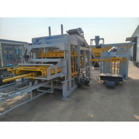 Machine industrielle automatique de fabrication de blocs contrôlée par PLC QT10-15, ligne de production de béton entièrement hydraulique pour sable, cendres volantes et ciment