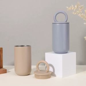 Bouteille d'eau isolée en acier inoxydable circulaire simple et créative, parfaite pour les voyages en plein air, transport pratique, tasse à café sous vide - Product Image 2