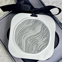 Diffuseur de parfum en céramique personnalisé avec logo OEM, décoration suspendue pour voiture, pierre aromatique parfumée