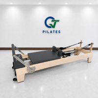 Reformer Pilates Kayu Maple Abu-abu Tua dengan Rel Tetap untuk Latihan Intensitas Tinggi dan Fasilitas Gym Hotel Mewah