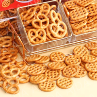 Machine de fabrication de biscuits croustillants de bretzel laiteux de vente chaude nouvelle ligne de production de collations de bretzels salés de farine de maïs