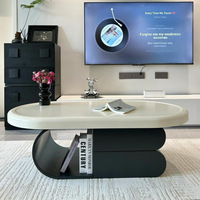 Grande table basse polyvalente de style crémeux à texture haut de gamme pour tout salon Rangement de forme ovale pour appartement de petite taille
