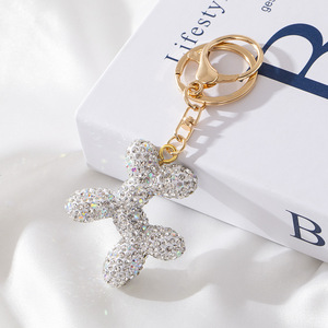 Llavero de perro con diamantes de imitación brillantes, colgante 3D de cachorro de dibujos animados para bolso, cierre de langosta dorado, dije de animal de cristal brillante, a la moda - Product Image 5