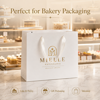 Sac en papier cartonné personnalisé de luxe blanc mat avec estampage à chaud doré et poignée en ruban pour l'emballage de pâtisseries, de bijoux et de boutiques