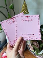 Dossiers à fenêtre en forme de cœur en matériau recyclé avec pelliculage mat et gaufrage pour l'emballage des faux cils