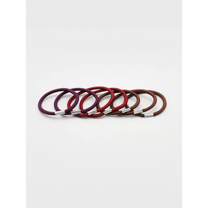 Set di 7 pezzi di cravatte per capelli con punte in gomma - Product Image 1