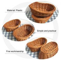Op maat gemaakte groothandel goedkope voedselveilige handgeweven PP-wicker brood- en fruitmandje van plastic rotan voor thuisgebruik