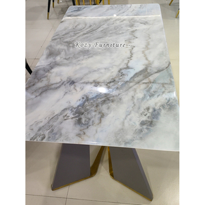<span class=keywords><strong>Table</strong></span> de salle à manger moderne <span class=keywords><strong>en</strong></span> céramique <span class=keywords><strong>avec</strong></span> <span class=keywords><strong>plateau</strong></span> <span class=keywords><strong>en</strong></span> pierre frittée effet marbre et base métallique - Product Image 4