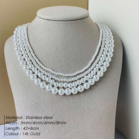 EMANCO Nouveaux Colliers en Perles d'Imitation Rondes Multi-Tailles Perles Blanches Chaîne en Acier Inoxydable pour Femme