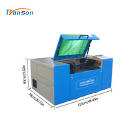 Máquina de Grabado Láser CNC de Sobremesa TRANSON para Cuero, Acrílico, Madera, Goma y Más - Refrigerada por Agua de Alta Calidad de Shandong