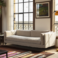 Canapé en tissu surdimensionné et confortable avec structure stable pour le repos domestique et l'accueil des invités