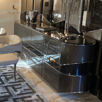 Console haut de gamme incurvée avec miroir en acier inoxydable, meuble d'entrée de luxe pour hall d'hôtel et villa