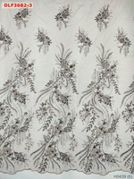 Tissus de mariée en polyester 100% à prix d'usine étincelants nouvelle broderie perlée lourde avec tissu de robe en maille durable à paillettes