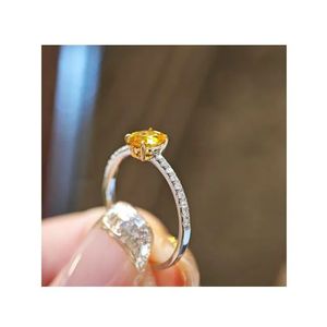 Bague de fiançailles Xinfly en or blanc 18 carats avec saphir jaune ovale naturel - Product Image 1