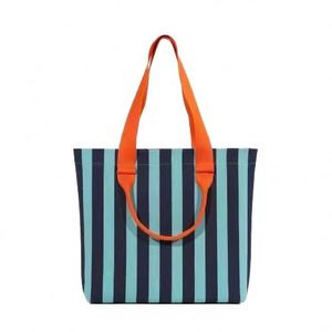 กระเป๋าโท้ทดีไซน์เนอร์หนังแท้สำหรับผู้หญิง พร้อมตัวล็อคสองอันและสายสะพายกว้าง - Product Image 1