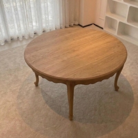 Table basse ronde vintage en bois de frêne massif, style rétro français haut de gamme, vente en gros pour hôtels et commerces