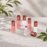 Botol Roll On Kaca Bulat untuk Minyak Esensial, Krim Mata Mini Custom, Kosmetik Parfum Berkualitas Tinggi 1ml 2ml 3ml 5ml dengan Tutup Rose Gold