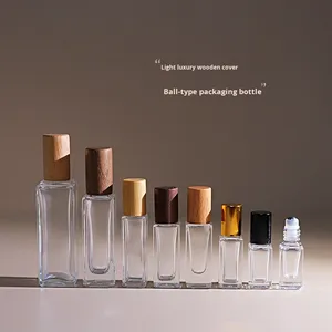 3ml 5ml 6ml 30ml Mini Doldurulabilir Parfüm Roll-on Şişesi Ahşap Kapaklı Roller Toplu Esansiyel Yağ Taşınabilir Kozmetik Boş Cam Şişe - Product Image 1
