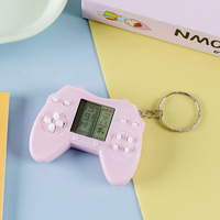Porte-clés console de jeu rétro miniature en plastique avec jeux d'arcade classiques intégrés, design anti-ennui pour les trajets quotidiens