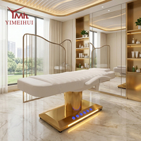 Lit de massage électrique haut de gamme à 3 moteurs, base en acier inoxydable doré, table de spa faciale extensible avec pédale pour clinique et spa