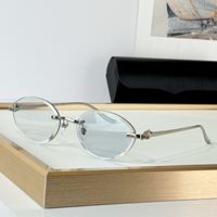 Lunettes de soleil de luxe pour femme, sans monture, ovales, monture en métal argenté, verres vert foncé, protection UV400, branches décorées, pour la mode et les soirées